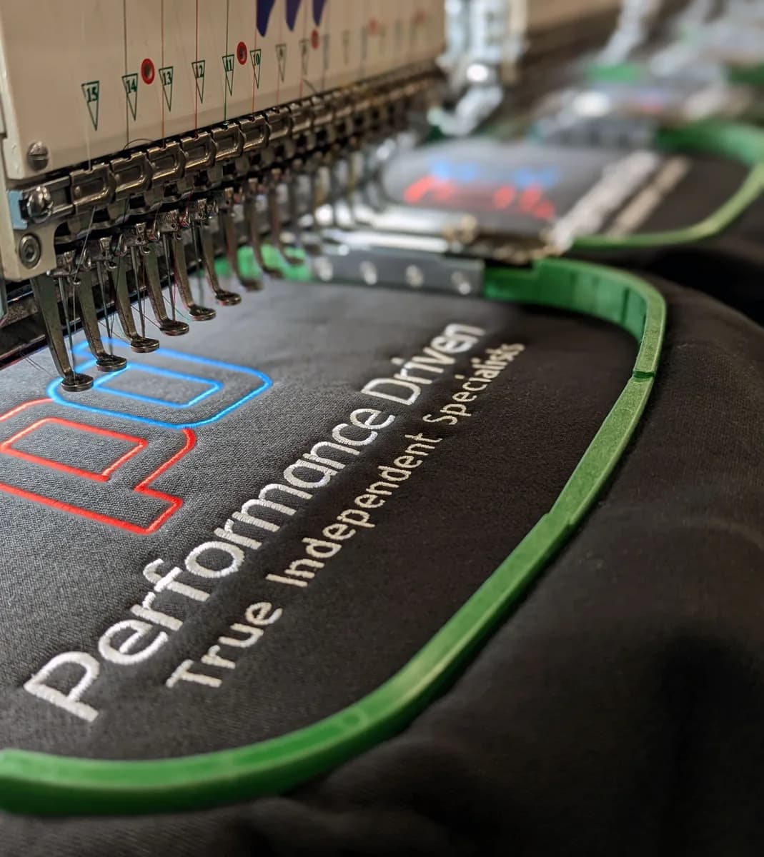 Custom embroidered workwear sample with company logo — embroidery services Orpington